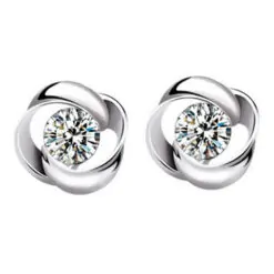 Vackra örhängen med strasskristaller i blomform